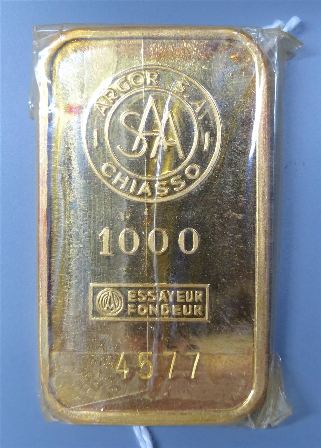 A Swiss Argor S.A. Chiasso 1000 yellow metal ingot, numbered 4577,